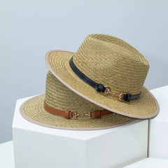 Two straw fedora hats with decorative bands, one dark and one tan/brown