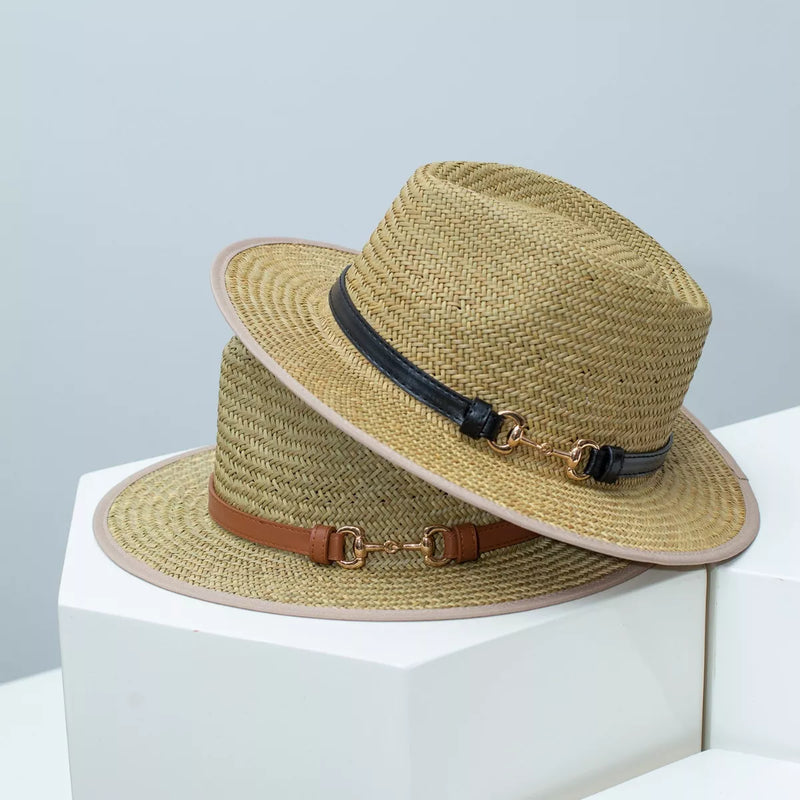 Two straw fedora hats with decorative bands, one dark and one tan/brown