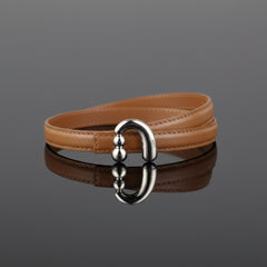 Caramel skinny leather belt with silver buckle and stitched leather strap