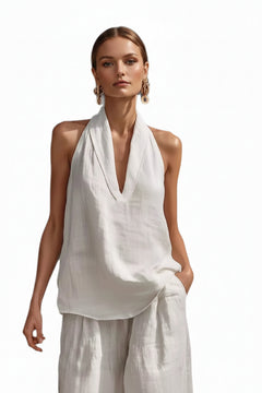 White halter neck top and wide-leg pants set, draped V-neck front
