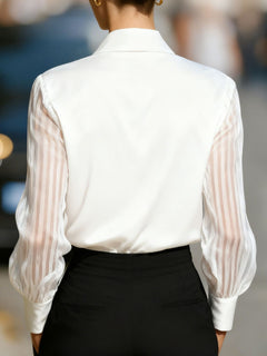 White collared blouse with sheer striped sleeves and back yoke
