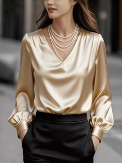 Apricot satin V-neck puff sleeve blouse with gathered cuffs