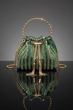 Rhinestone bucket crossbody bag in green with gold-toned trim and chain straps