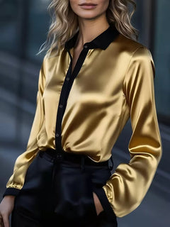 Gold satin button-up long sleeve blouse with black collar and placket