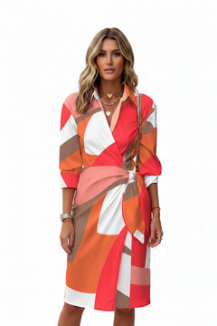 Red, orange, and white printed collared shirt dress with waist tie, knee-length.