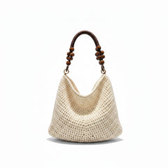 Crocheted handbag with wooden handle