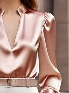 Pink notched long-sleeve blouse with notched collar and ruched puff sleeve