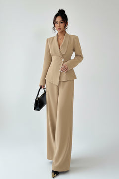 Beige one-button blazer and wide-leg pants set, tailored waist, long sleeves.