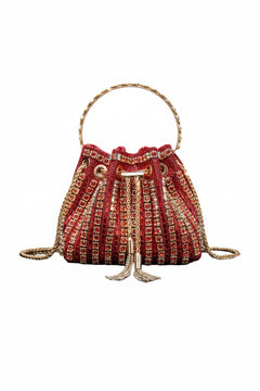 Red rhinestone bucket crossbody bag with top handle and tassel drawstring closure.