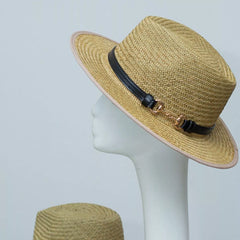 Straw fedora hat with decorative dark band and metal chain detail