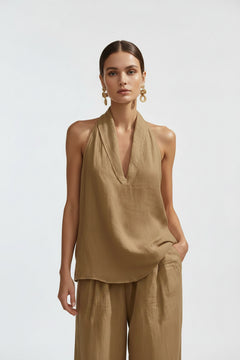 Beige halter neck top and wide-leg pants set, draped front and wide legs