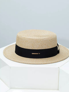Beige straw boater hat with black ribbon band and gold bar detail