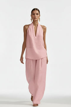 Pink halter neck top and wide-leg pants set with V-neck and flowy layers