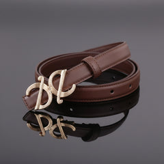 Brown leather belt with ornate metallic buckle, stitched strap and perforated holes
