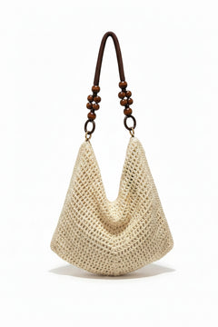  
A beige woven handbag 