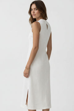 White sleeveless mock neck midi dress, side view with front slit