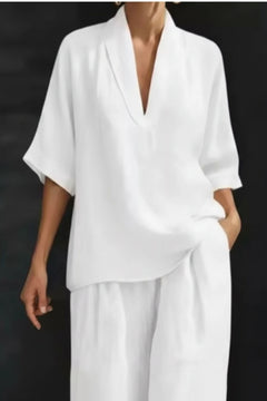 White half-sleeve V-neck top and wide-leg pants set with loose, flowing fit