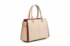 Apricot leather top-handle handbag with smooth front and burgundy side panels