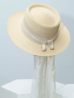 Ribbon-accent straw sun hat in ivory with white ribbon band and tied sash ends