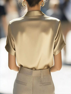 Camel satin wrap blouse back view with short sleeves and smooth drape