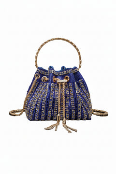 Blue rhinestone bucket crossbody bag with top handle and tassel drawstring closure.