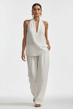 White halter neck top and wide-leg pants set, wrap-style V neckline