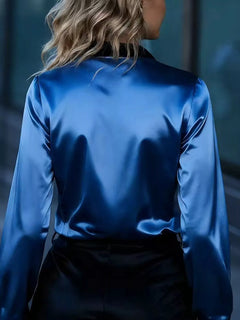Blue satin button-up long sleeve blouse, back view