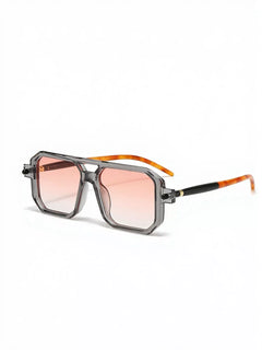 Square-frame sunglasses with dark frames, orange temple tips, and pink lenses