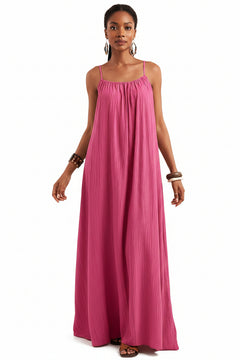 Fuchsia pink spaghetti-strap flowy maxi dress with gathered neckline and pleated skirt