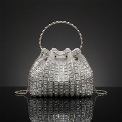 Rhinestone bucket crossbody bag in silver with curved top handle and chain straps