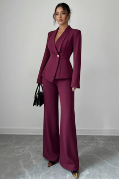 Burgundy one-button blazer and matching wide-leg pants set, notched lapels.