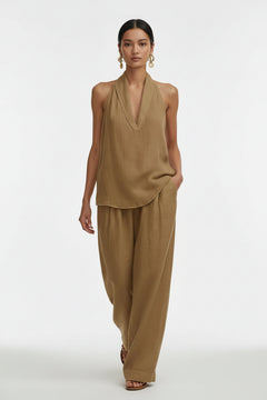 Beige halter neck top and wide-leg pants set, sleeveless V halter neckline