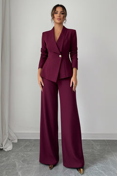 Burgundy one-button blazer and wide-leg pants set with matching tailored trousers.