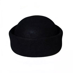Black wool pillbox hat with rounded crown and short curved brim