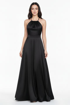 Black halter neck maxi dress with ruched neckline and flowing A-line skirt