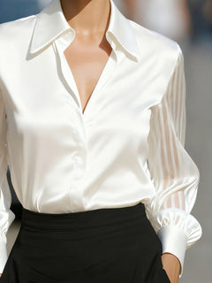 White collared blouse with button-front V-neck and sheer striped sleeve panels