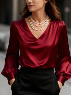 Red satin V-neck puff sleeve blouse with gathered cuffs