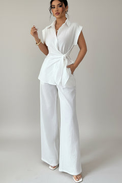 Off-white collared cap-sleeve top with knot waist and wide-leg pants set