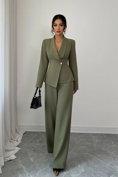 Olive green one-button blazer and pants set with notched lapel and wide-leg trousers.