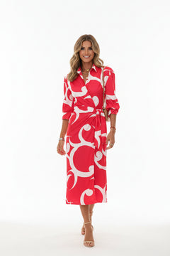 Red printed collared shirt dress with waist tie, knee-length hem, 3/4 sleeves.
