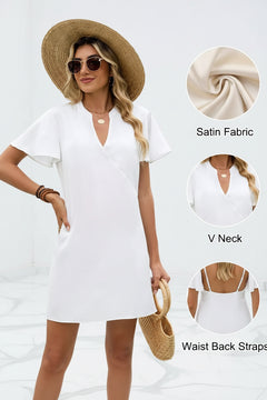 White satin mini dress with V-neck and flutter sleeves; waist back straps
