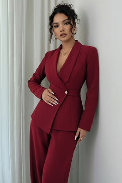 One-button blazer and pants set in burgundy, with long sleeves and wide-leg trousers.