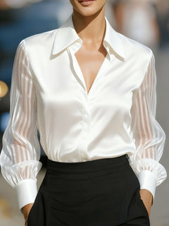 White collared blouse with button-front V-neck and sheer striped sleeves