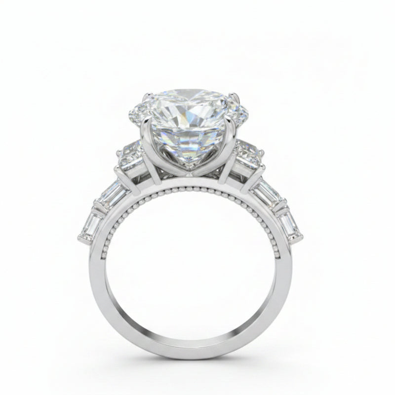 Sterling silver ring with oval center moissanite and baguette side stones, openwork setting