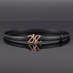 Black leather belt with ornate metallic buckle in the center, punched strap holes