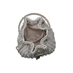 Silver rhinestone bucket crossbody bag shown open with fabric lining and drawstring ties.