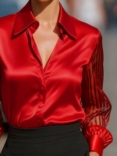 Red collared blouse with button-front V-neck and sheer striped sleeve cuffs