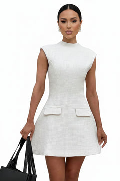 White textured mini dress, round neck, cap sleeves, flared skirt, front flap pockets