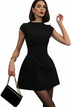 Mock neck A-line mini dress in black with short sleeves and front patch pockets