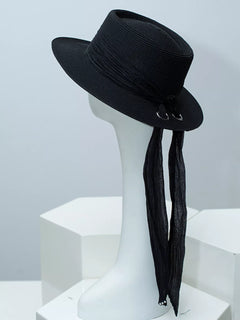 Ribbon-accent straw sun hat in black with long sash ribbon ties